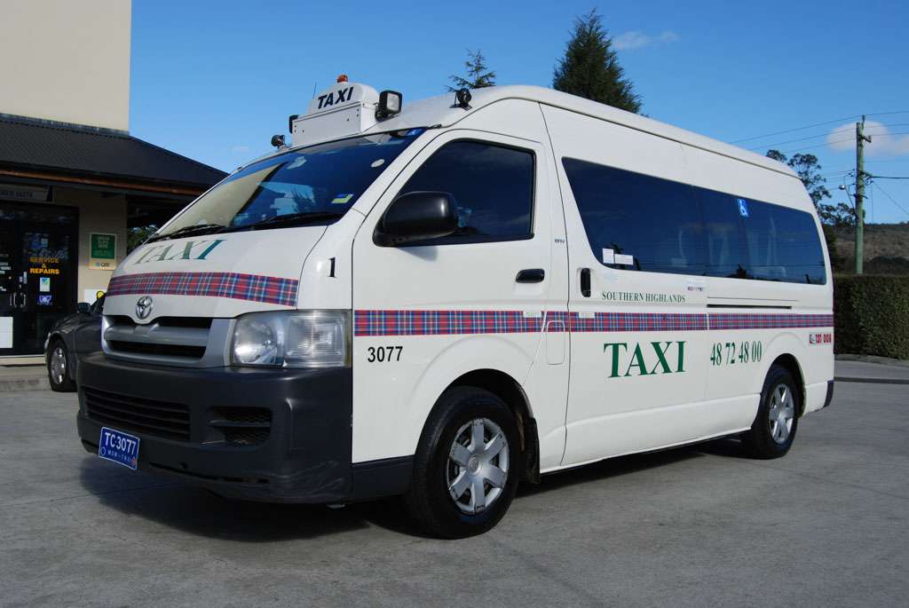 a white van with green and red stripes